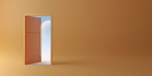 an open door leading to a bright orange room